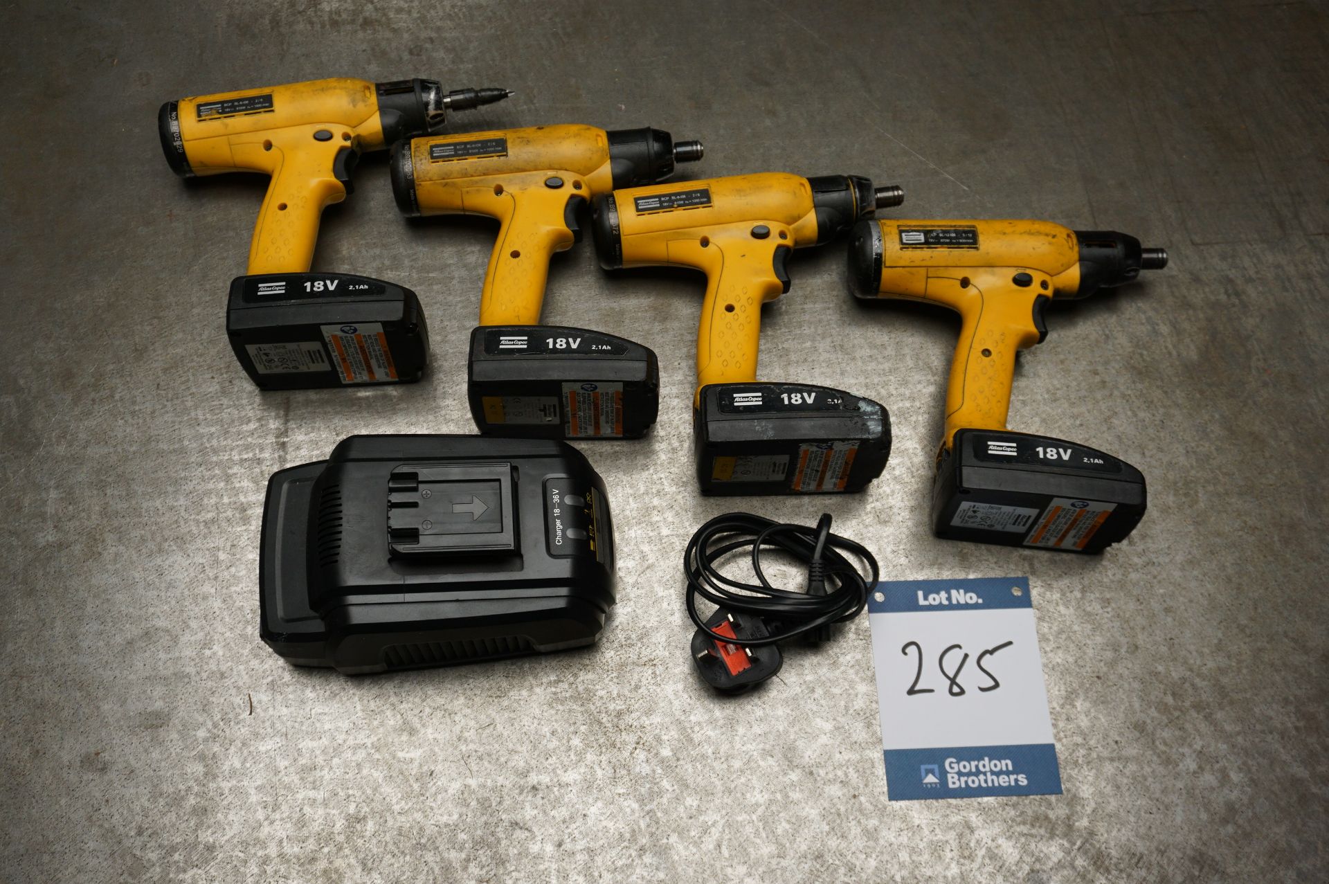 4 x Atlas Copco BCP BL-6-I06 -2/6, 18 volt cordless screwdrivers with charging unit