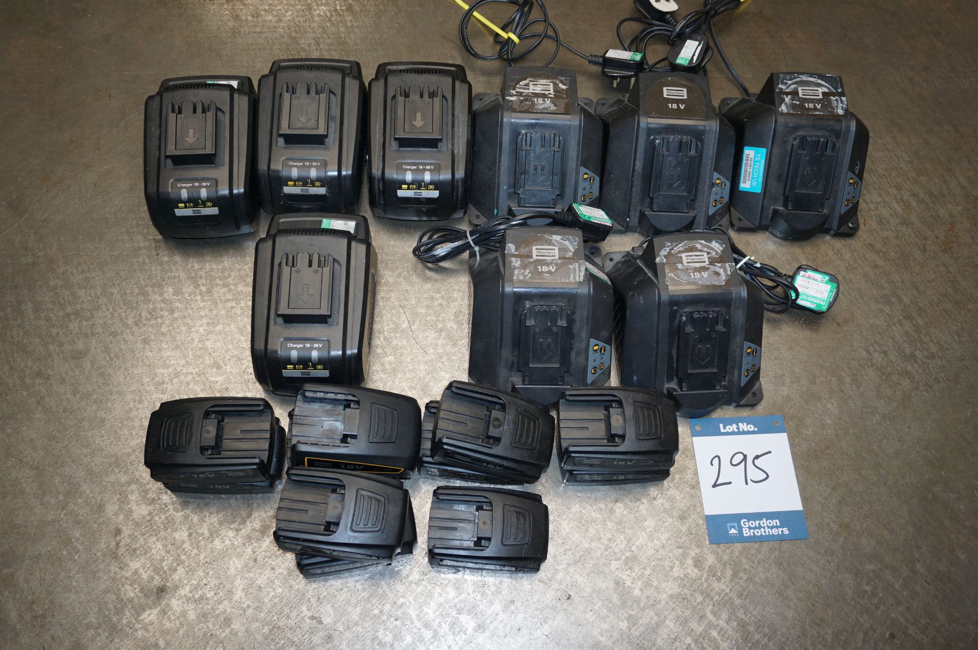 9 x Atlas Copco 18 Volt charging units and 11 x 18 volt batteries