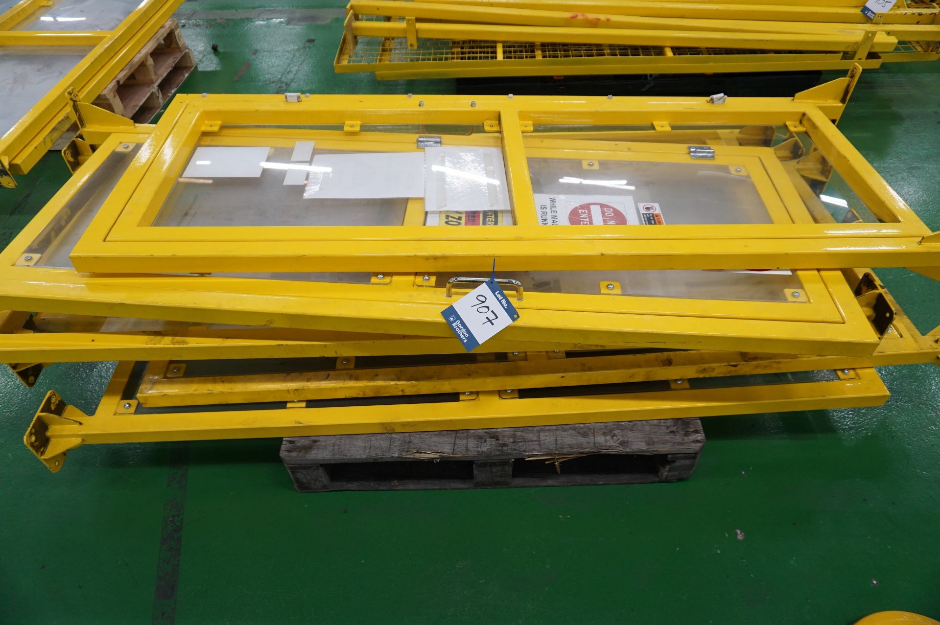 Quantity of steel framed machine caging with PVC plastic screens