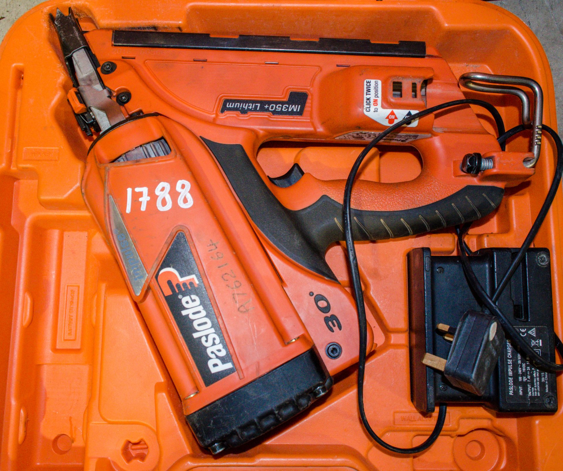 Paslode nail gun c/w charger & carry case A762184 ** No battery **