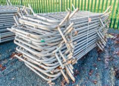 Approximately 30 steel heras fencing panels