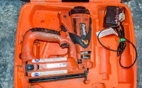 Paslode IM65 cordless nail gun c/w charger & carry case ** No battery **