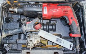 Milwaukee PH27 SDS hammer drill c/w carry case ** In disrepair **