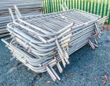 Approximately 23 steel heras fencing panels