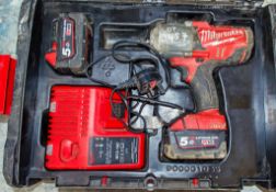 Milwaukee cordless 1/2 inch drive impact gun c/w charger, 2 - batteries & carry case