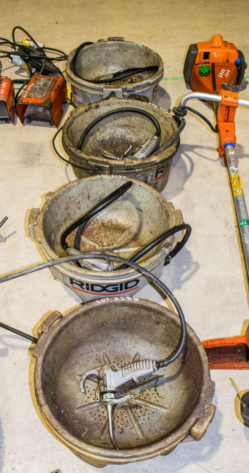 4 - Ridgid lubricant catch buckets each c/w lube guns