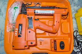 Paslode Impulse cordless nail gun c/w charger, carry case & 2 - batteries