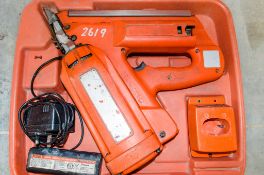 Paslode cordless nail gun c/w charger, battery & carry case