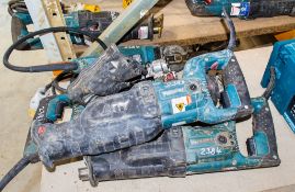 4 - Makita 110v reciprocating saws ** All with cords cut off or parts missing **