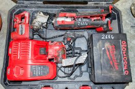 Milwaukee cordless saw c/w charger & carry case ** In disrepair **