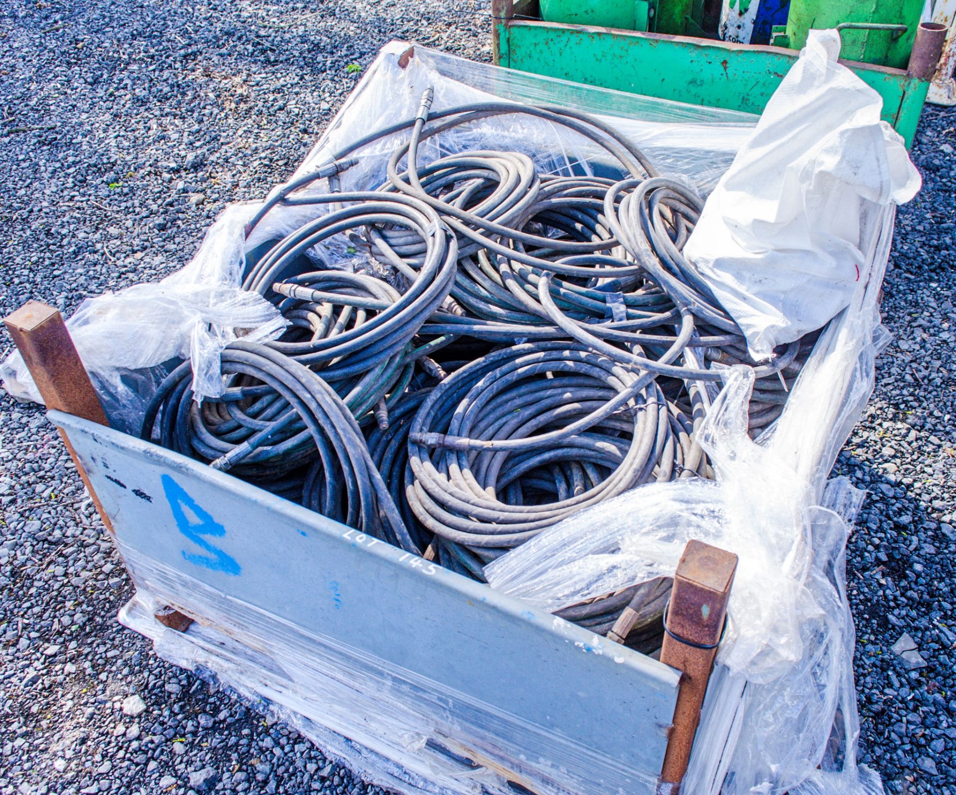 Stillage of hydraulic hoses & bag of fittings