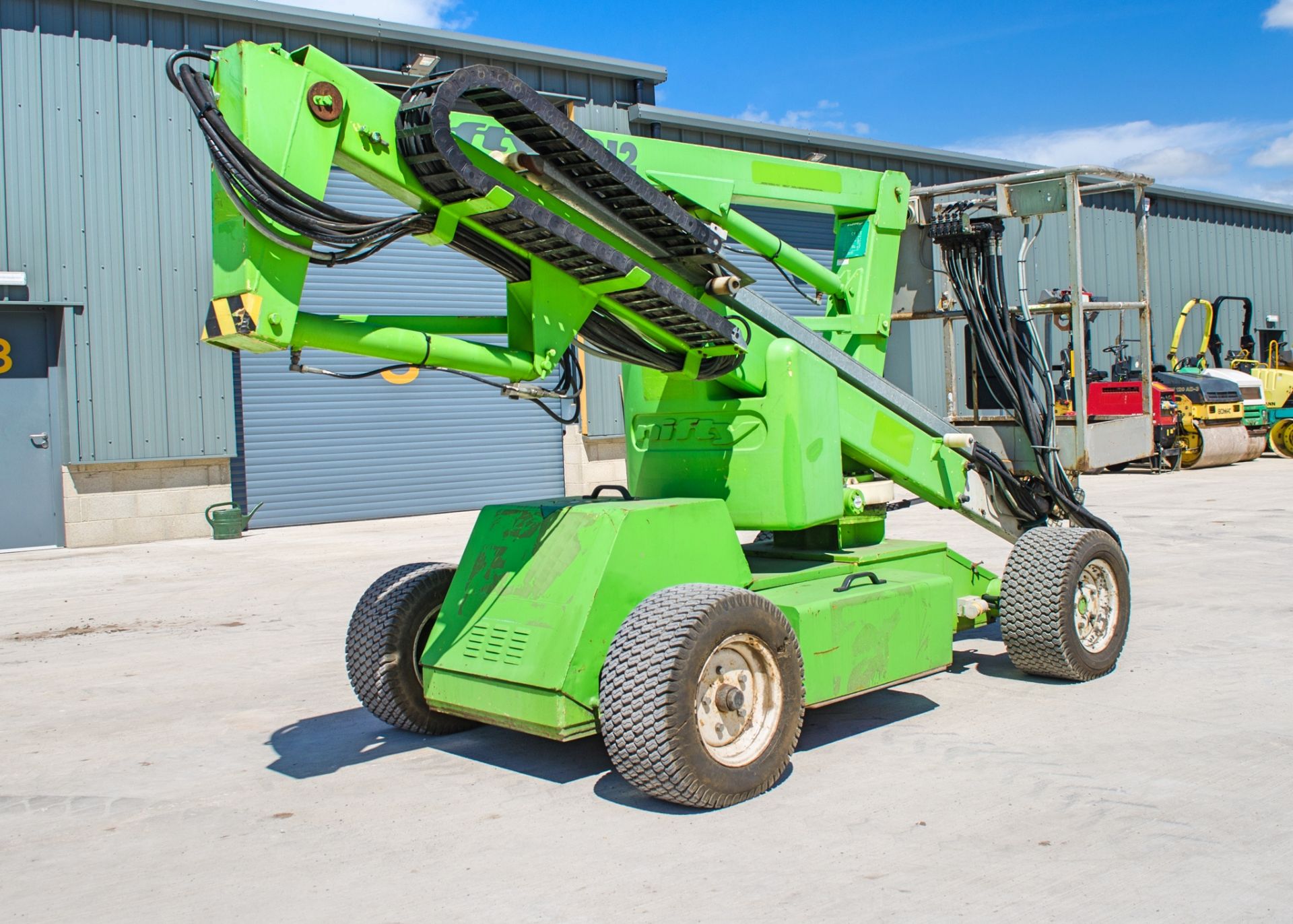 Nifty HR12 battery electric/diesel articulated boom lift access platform Year: 2007 S/N: 16530 SHC - Image 4 of 16