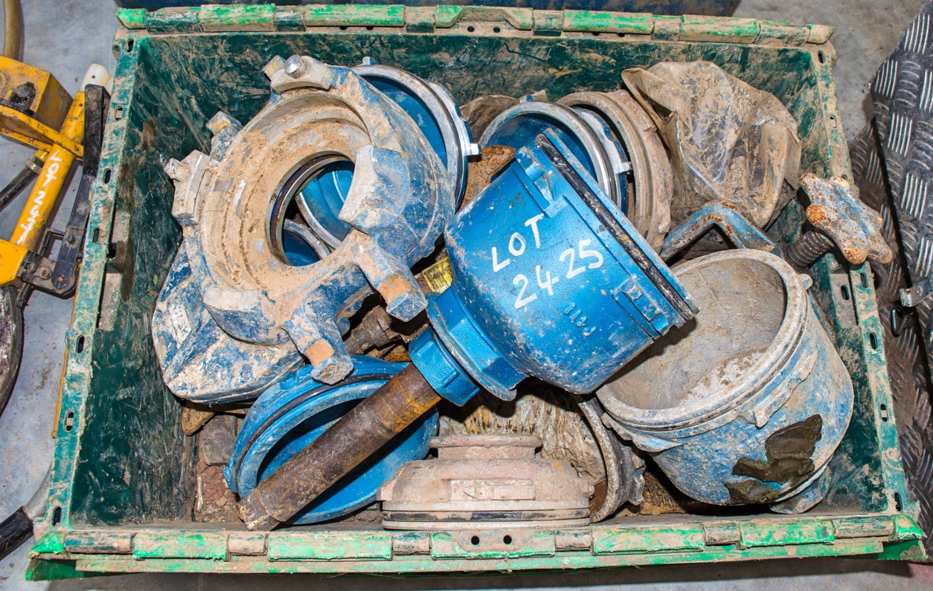 Box of miscellaneous pipe fittings as photographed