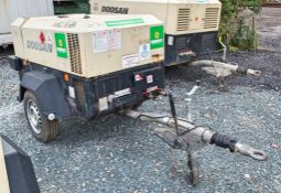 Doosan 7/41 diesel driven mobile air compressor Year: 2014 S/N: 432582 Recorded Hours: 1137 A633581