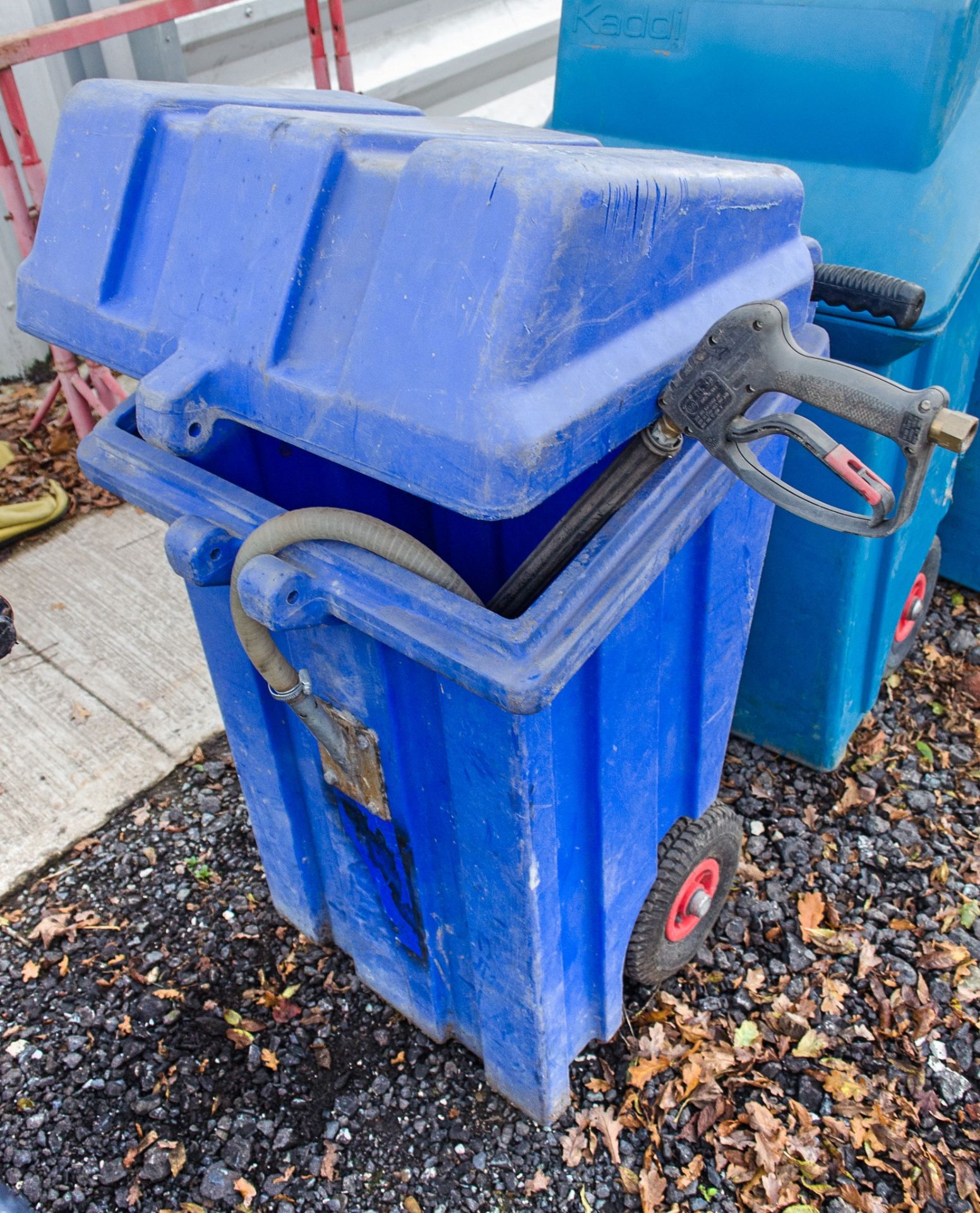 Wheeled sand dispenser