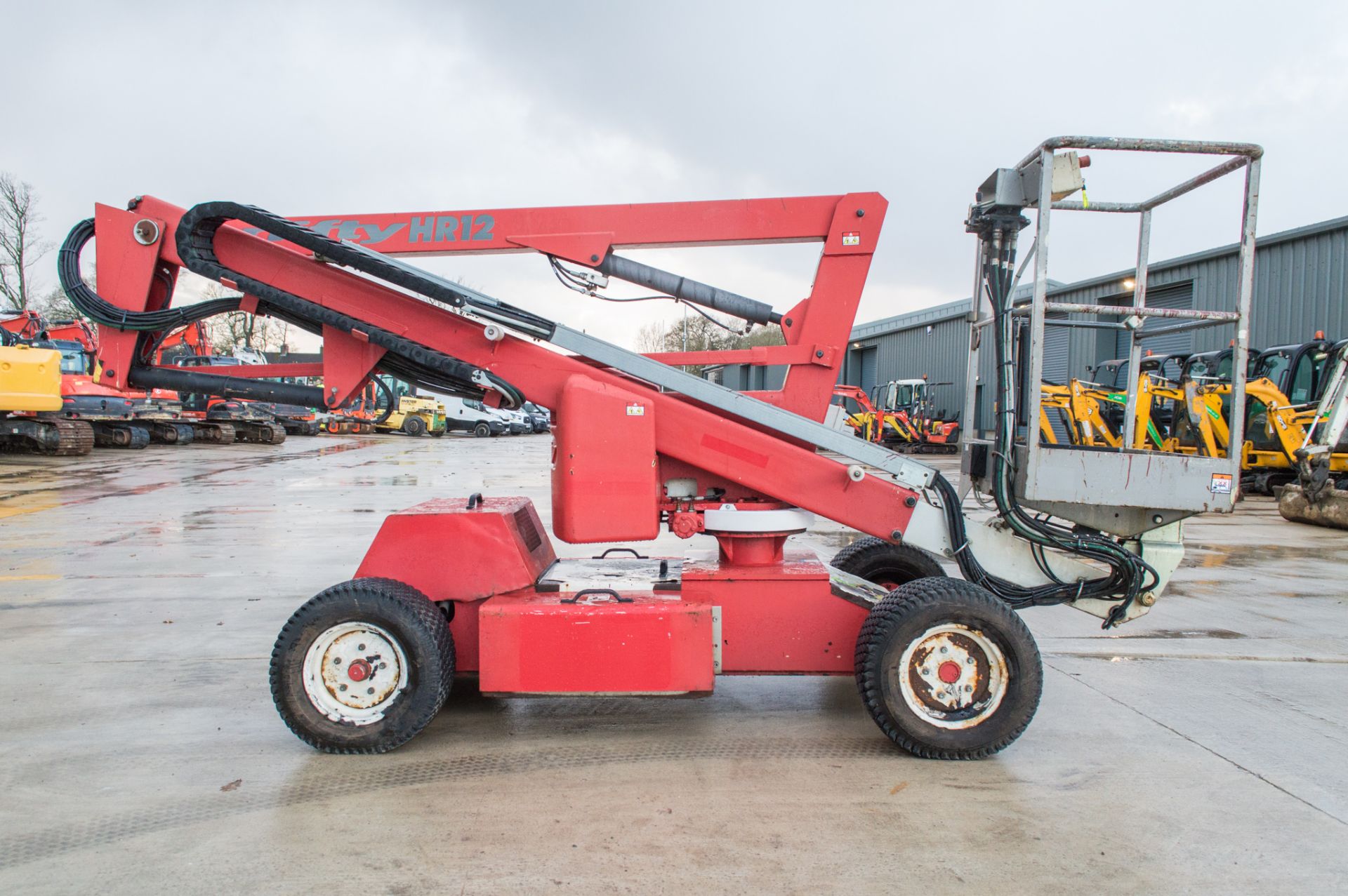 Nifty HR12 battery/diesel articulated boom access platform Year: 2010 S/N: 19297 - Image 12 of 18