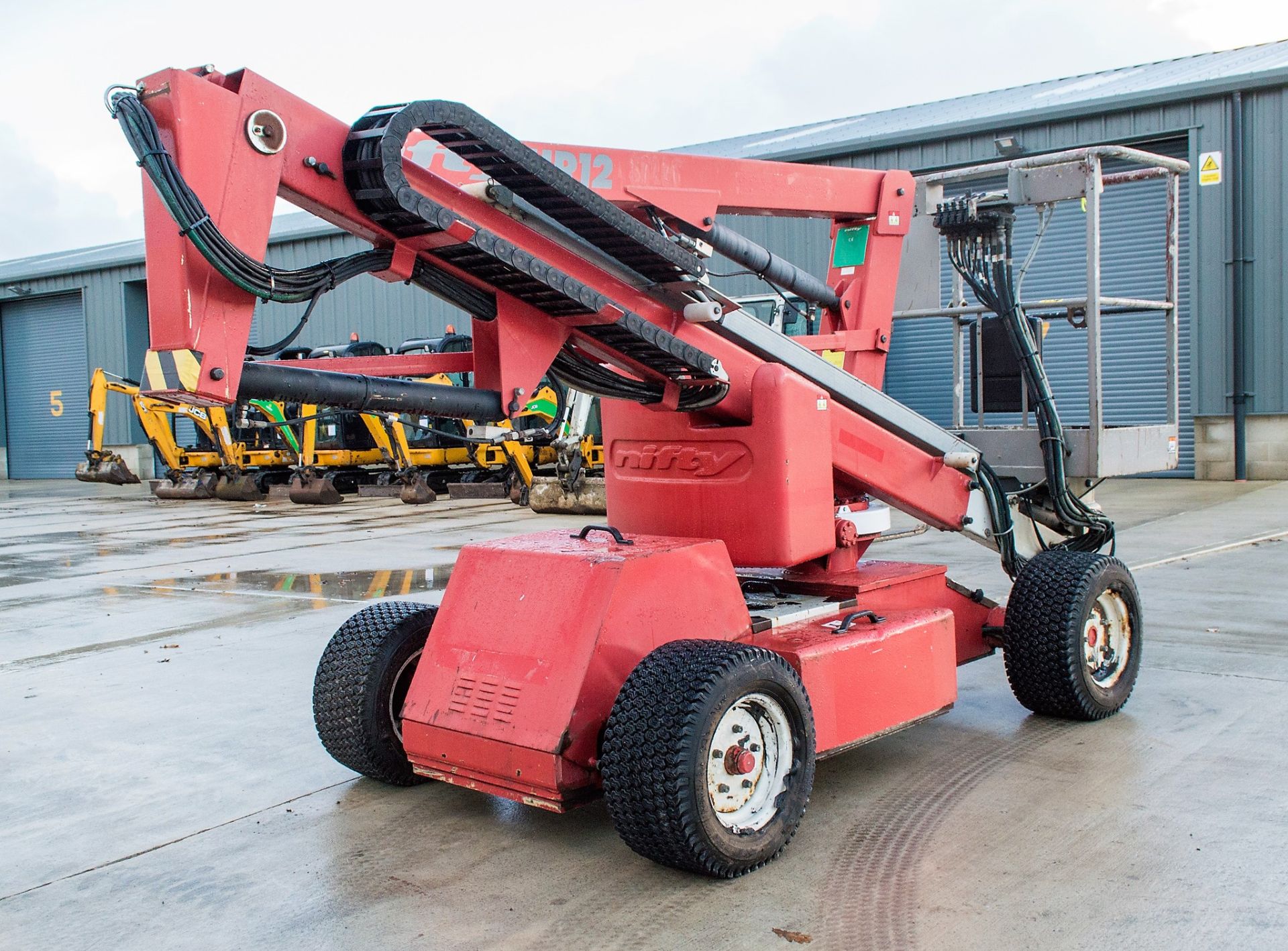Nifty HR12 battery/diesel articulated boom access platform Year: 2010 S/N: 19297 - Image 3 of 18