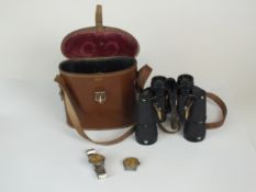 Two Moeris WW2 military watches and a pair of binoculars