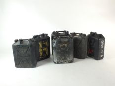 Six British Army 25 litre water storage jerry cans, in used condition, some painted