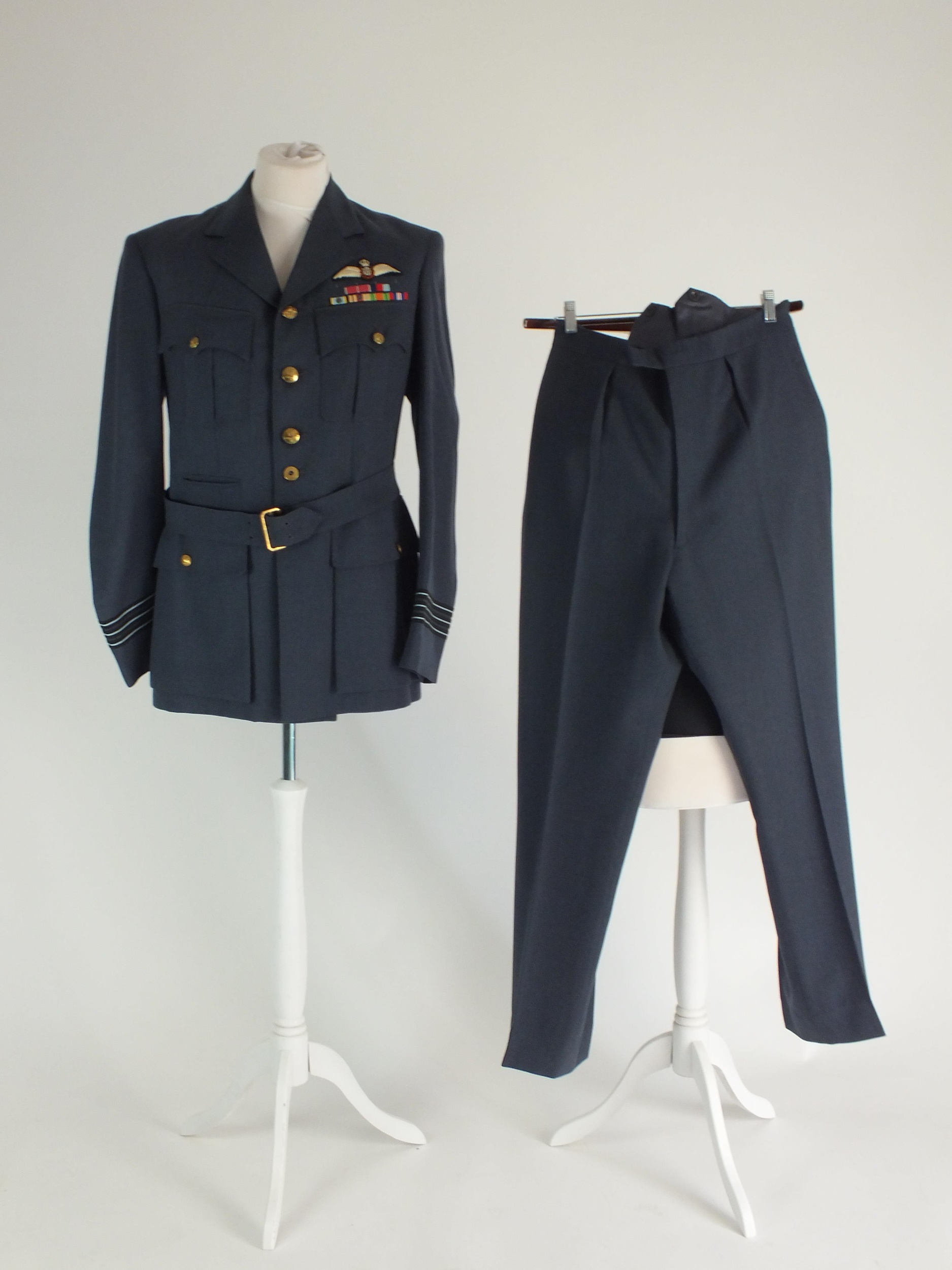 A British RAF Wing Commander's dress uniform comprising jacket and pair of trousers, the jacket with