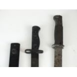 British Lee Enfield LA13 bayonet and German S84/98 bayonet