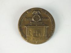 A 1936 NSDAP badge commemorating the 10th Anniversary of the Party Rally at Weimar by Hermann