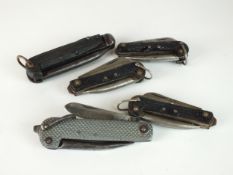 Four military pocket knives and one further pocket knife