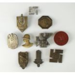 A collection of German tinnies and badges