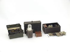 A British Army WW2 Field Telephone Set L MK/1, a brass compass in a wooden box with inlaid naval