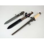 Reproduction German Hitler Youth knives and a reproduction Heer dagger
