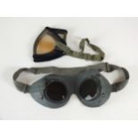 A pair of German WW2 tropical dust goggles together with a pair of German WW2 grey leather