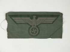 German Wehrmacht Heer (Army) BeVo breast eagle, subdued grey eagle against field grey backing.