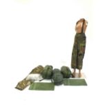 A collection including three military sleeping bags, military hand towels, numerous pairs of