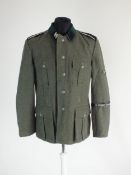 A good re-enactor or film set prop uniform for a German SS Polizei Division Mann, the tunic with