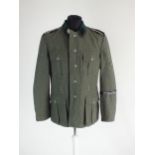 A good re-enactor or film set prop uniform for a German SS Polizei Division Mann, the tunic with