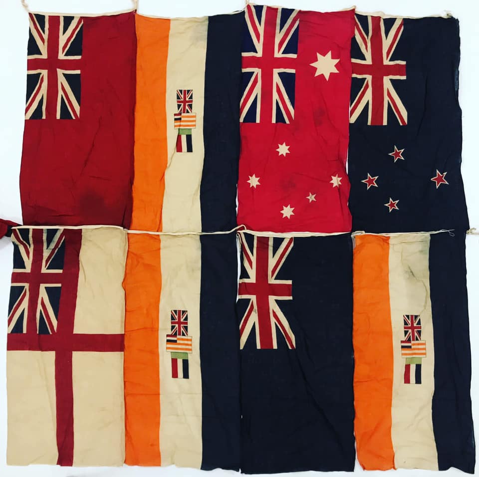 A set of International Code of Signal (ICS) maritime flags and pennants the total of sixty-five