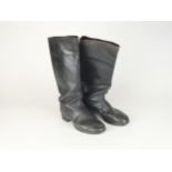 A pair of German WW2 black leather jack boots with interior pulls (one heel slightly loose)