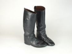 A pair of German WW2 black leather jack boots with interior pulls, no visible markings