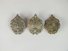 Three Argyll and Sutherland glengarry badges, die-stamped white metal (3)