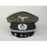 A German Army Administration Officer's visor cap, Austrian-made