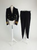 A Royal Navy dress uniform comprising jacket, trousers and waistcoat, tailored by Gieves Ltd London,