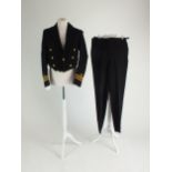 A Royal Navy dress uniform comprising jacket, trousers and waistcoat, tailored by Gieves Ltd London,