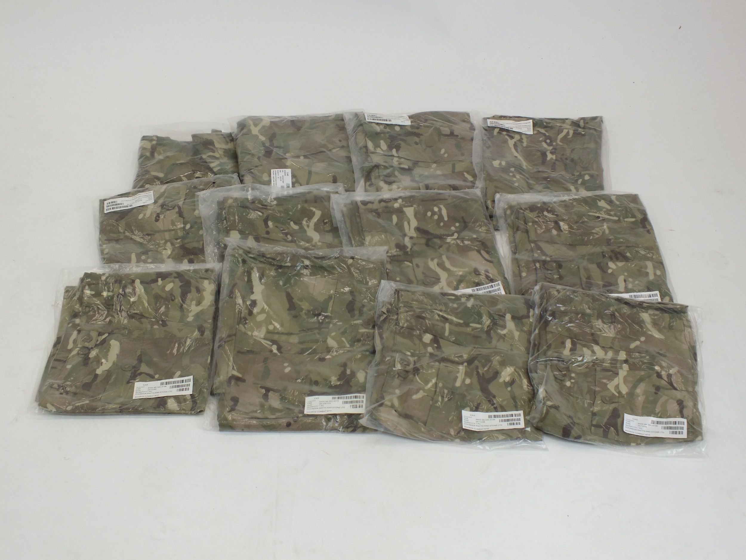 Approximately twenty-seven pairs of Cooneen Watts and Stone military camouflage combat shorts