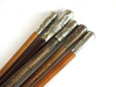 Four British Regimental swagger sticks with white metal tops