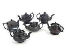 Six black glazed black basalt toy or bachelor teapots and covers circa 1820-35 including a Cyples