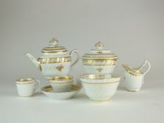 A rare Chamberlain's Worcester hybrid hard-paste porcelain toy tea service circa 1796-98 of