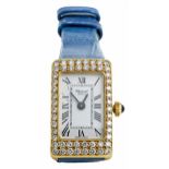 Goldene CHOPARD Damenuhr mit Brillanten