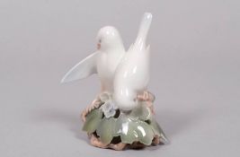 Pair of doves on a cherry blossom branch, design by Theodor Madsen in 1902 for Royal Copenhagen, De