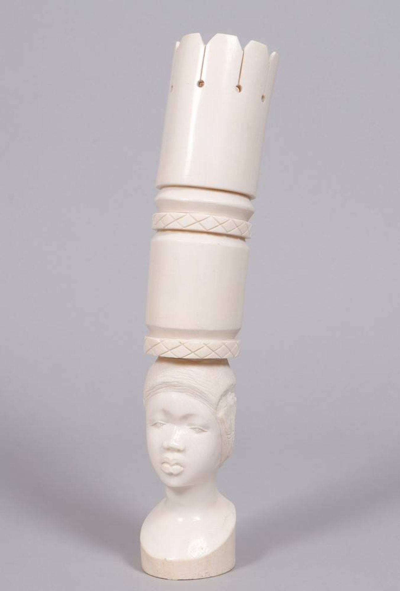 Woman's head with a high crown, Africa