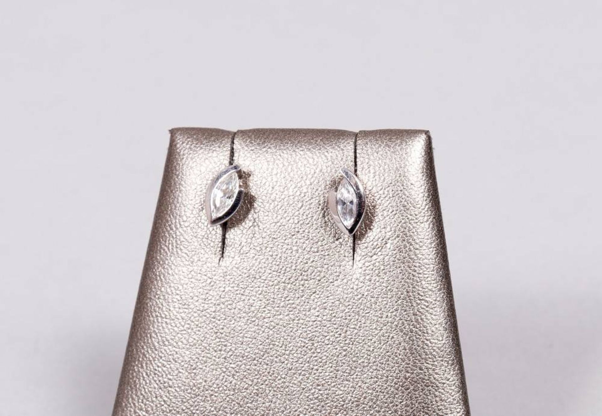 Modern white gold stud earrings